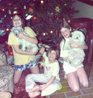 Childhood pic of (L to R) sister Greer, brother Patrick, and Elizabeth during Christmas time